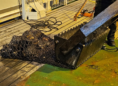 Dredge bag containing rock samples.